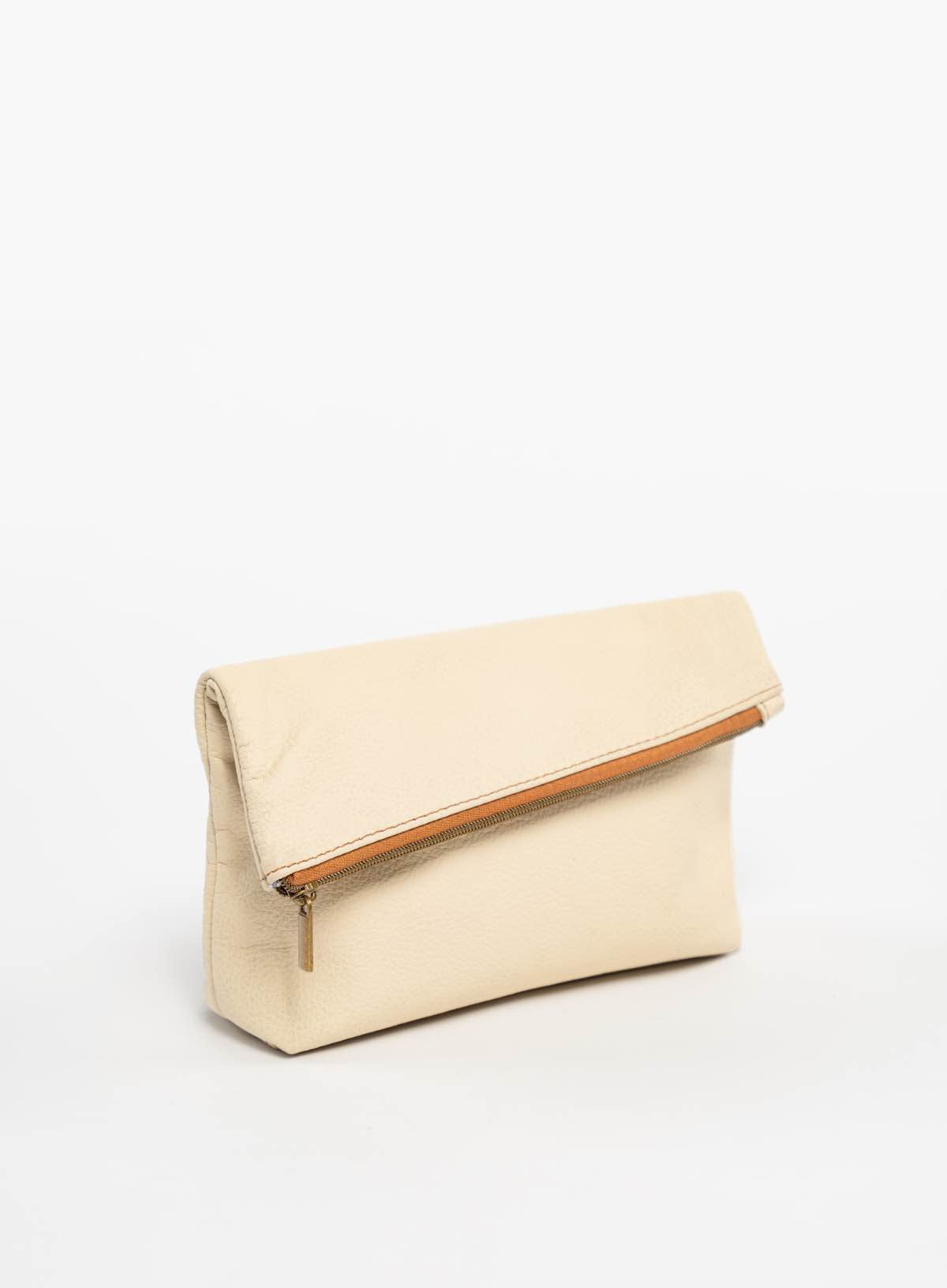 womens leather makeup bag in bone side view folded over from fall collection.