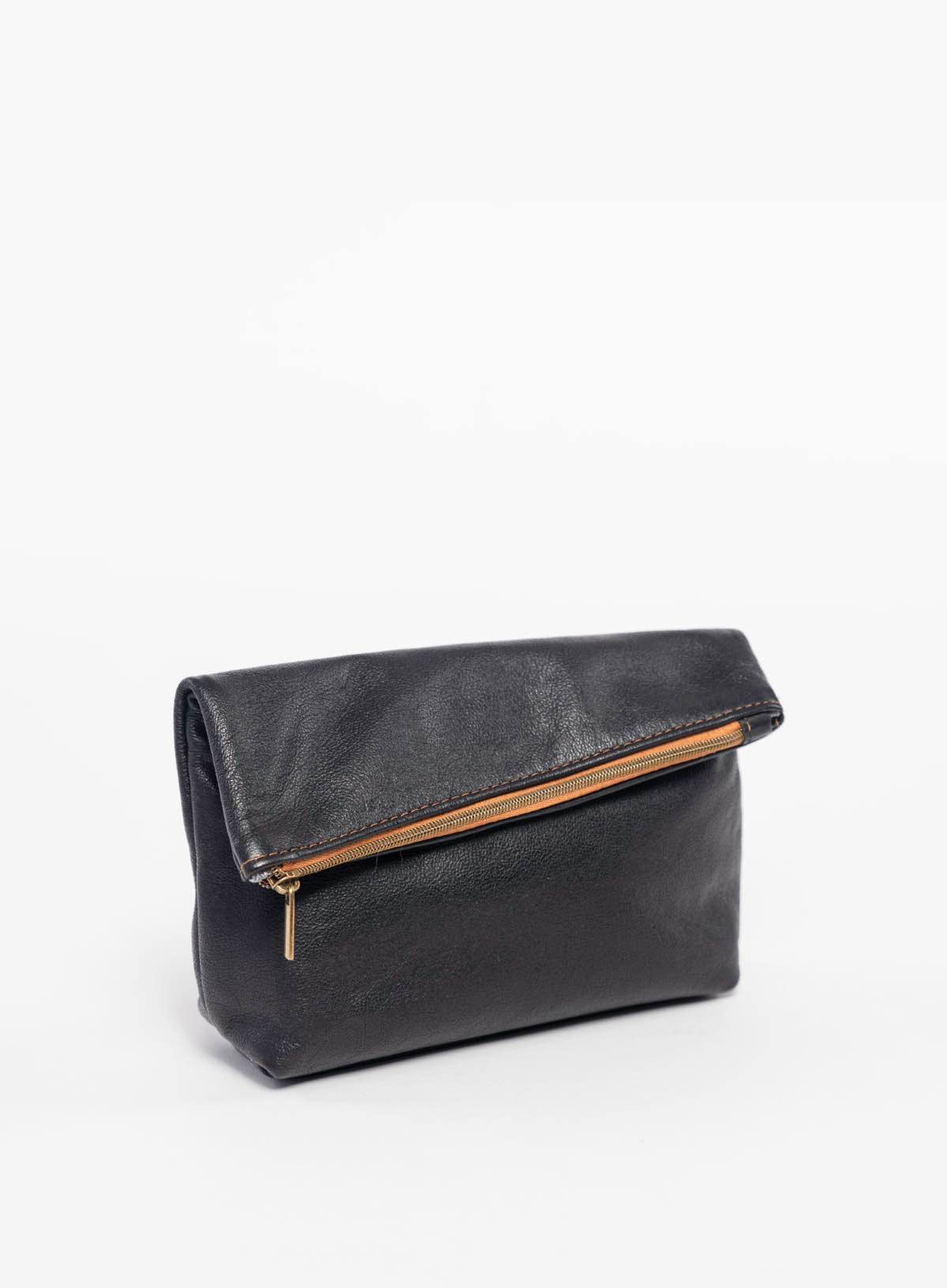 womens leather makeup bag in black side view folded over from fall collection.