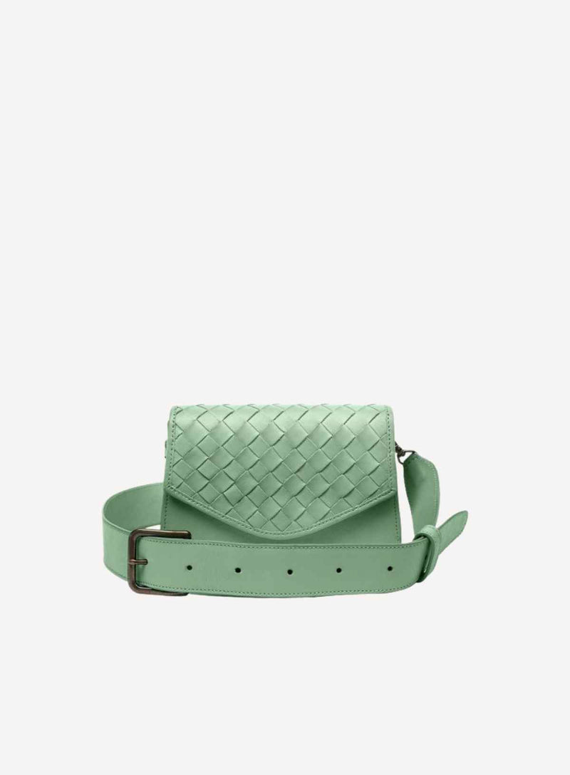 woven belt bag for the spring sale in sage green front-view.