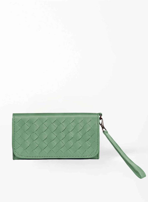 woven wristlet in green from our spring collection showcasing front view.