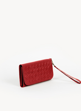 woven wristlet wallet from ethically crafted accessories in red showcasing side view.